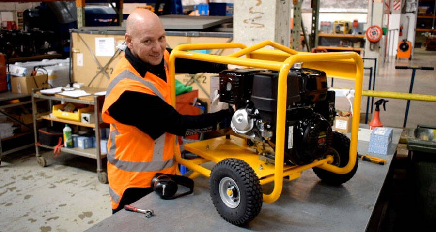 Photo of a YR engineer working on a YR PRO generator