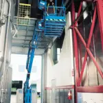 Genie Z-34/22 N narrow chassis z-boom articulating boom working in a narrow space