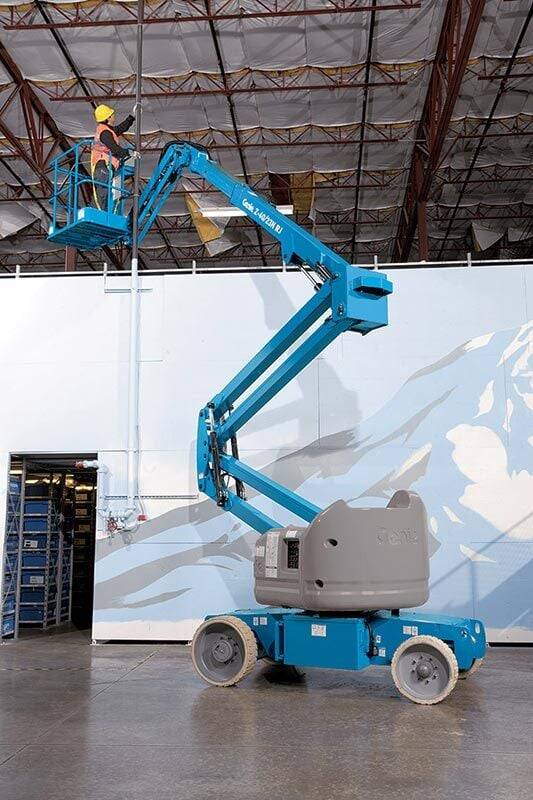 Genie Z40/23 NRJ articulating boom good reach to ceiling in warehouse